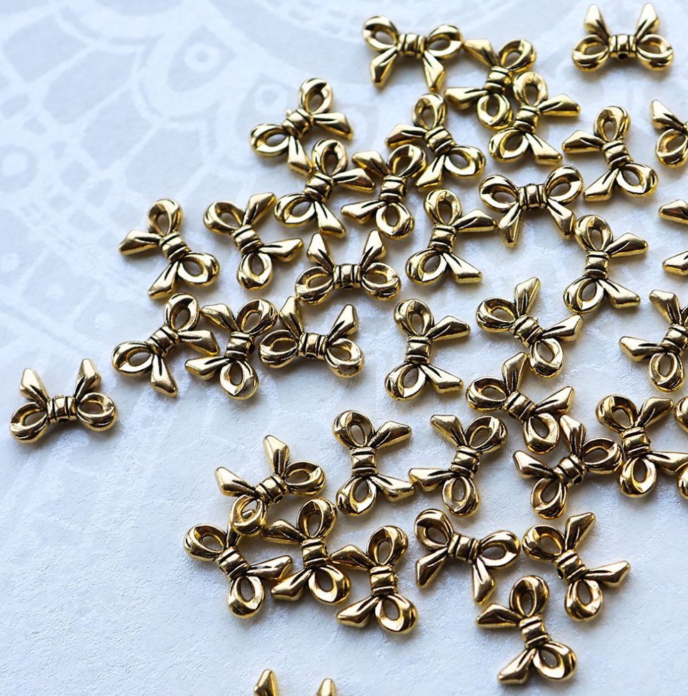 разделитель для бусин "бантик", цвет античное золото, 14x10x3 мм