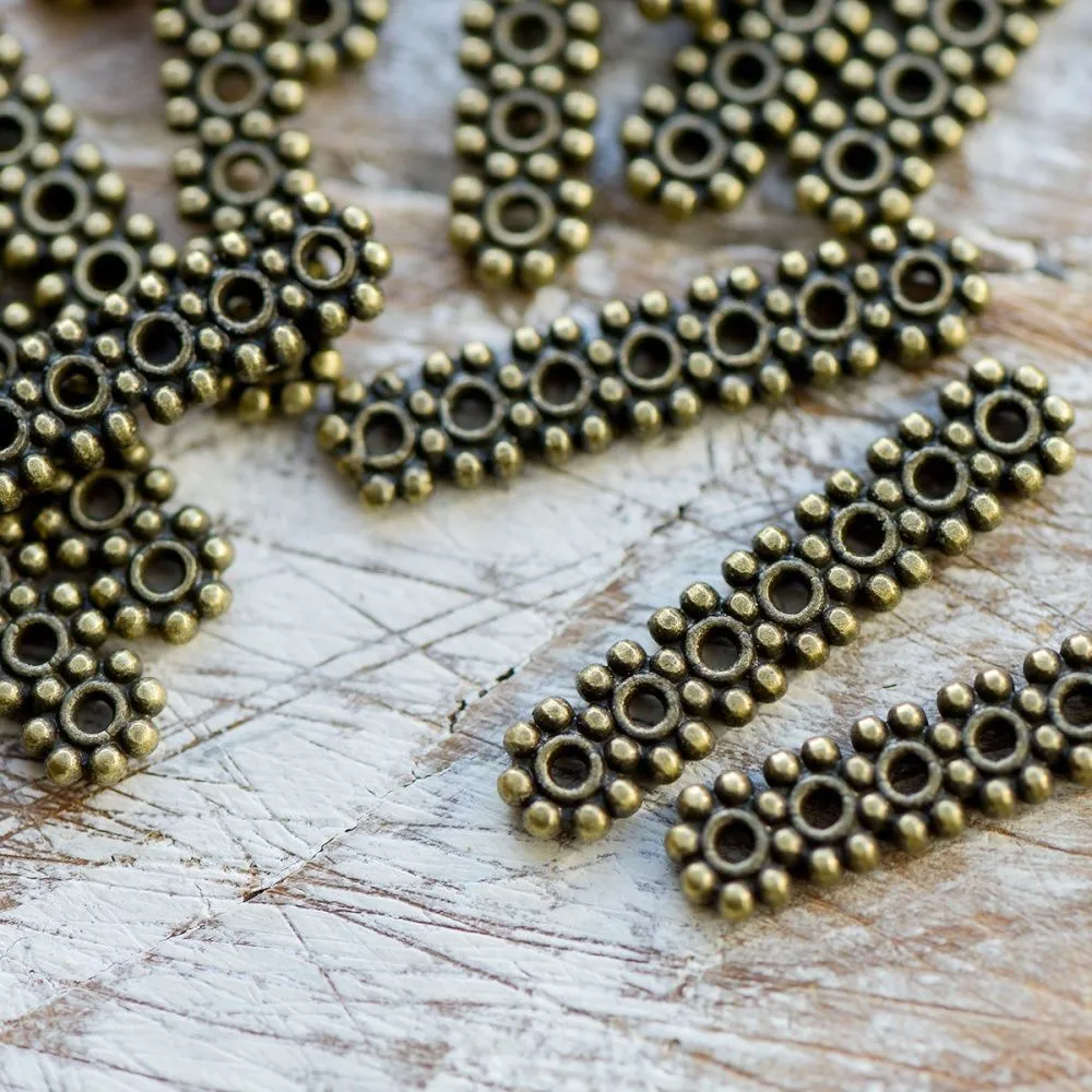 разделитель 7-отв. "ромашка", цвет античная бронза, 23x5 мм