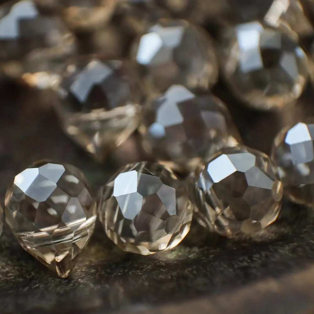 бусина "капля", граненая, стекло, цвет шампанского, 10-11x8 мм